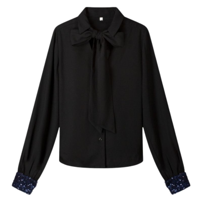 Blusa negra con lazo al cuello – Estilo elegante y femenino para looks sofisticados